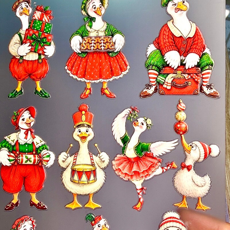 Christmasgoosestickerscarryinggifts_bakinggingerbreadcookies_dancingandbalancingornaments