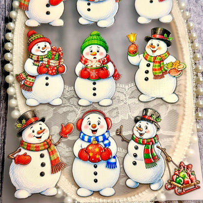 Christmassnowmanstickerswithgifts_hotcocoa_cookies_agoldenbellandanornament-filledsled