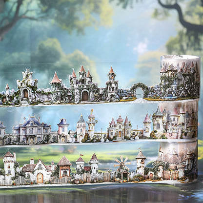 A rolled-up 3D puzzle model depicting a whimsical fairytale village with castles, cottages, windmills, and bridges, shown against a blurred fantasy forest background.