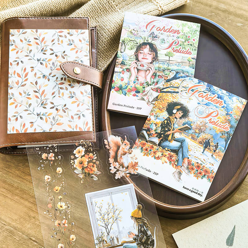 FourSeasonsGardenstickerbookswithvintagefloraldesignsdisplayedalongsidetransparentdecorativestickers