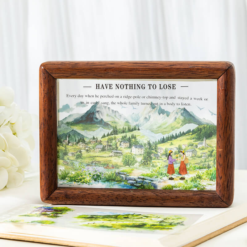 Framedjournalcollagefeaturingmountainscenery_agreenmeadow_andillustratedcharacters