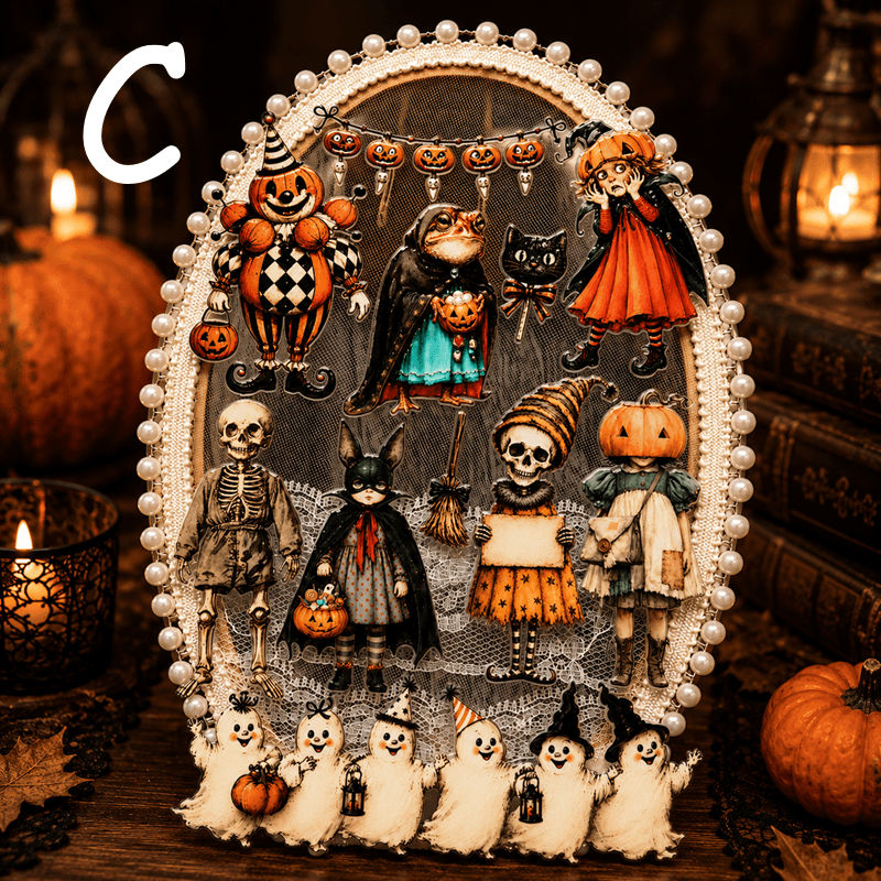 A decorative oval Halloween-themed plaque or wall hanging with a pearl-beaded border, featuring illustrated pumpkins, skeletons, ghosts, a cat, a bird, and small ghost figures against a dark patterned background. The piece is photographed on a wooden surface with candles, pumpkins, and books around it.