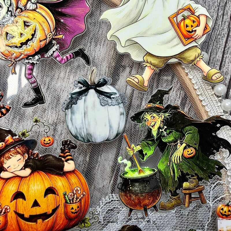 A Halloween-themed collage of illustrated and photographed decorative elements, including jack-o'-lanterns, a witch in a green robe by a cauldron, a white pumpkin with a black bow, lace trim, and a ghostly child in a white dress.