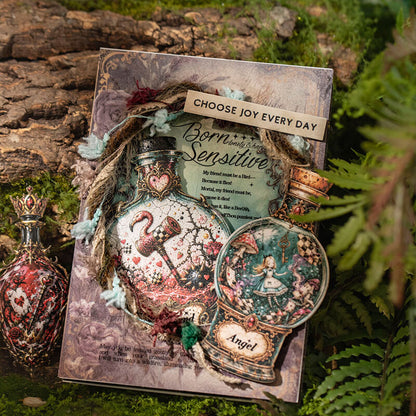 HandmadevintagescrapbookcollagedecoratedwithAliceinWonderlandbottlestickers