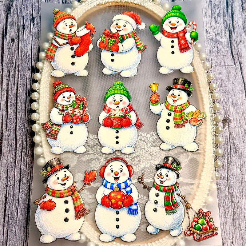 NinevintageChristmassnowmanstickerswithcolorfulscarvesandhats_holdinggifts_cocoa_abell_andornaments_displayedonadecorativetray