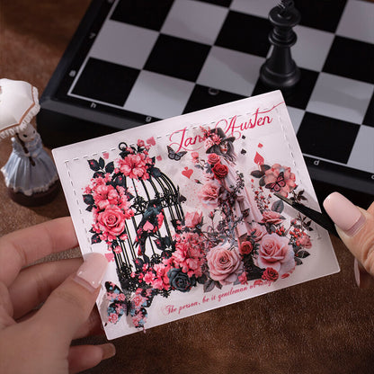 Pink_floral_collage_card_decorated_with_Wonderland_stickers_of_a_woman_in_a_top_hat_birdcage_roses_and_butterflies