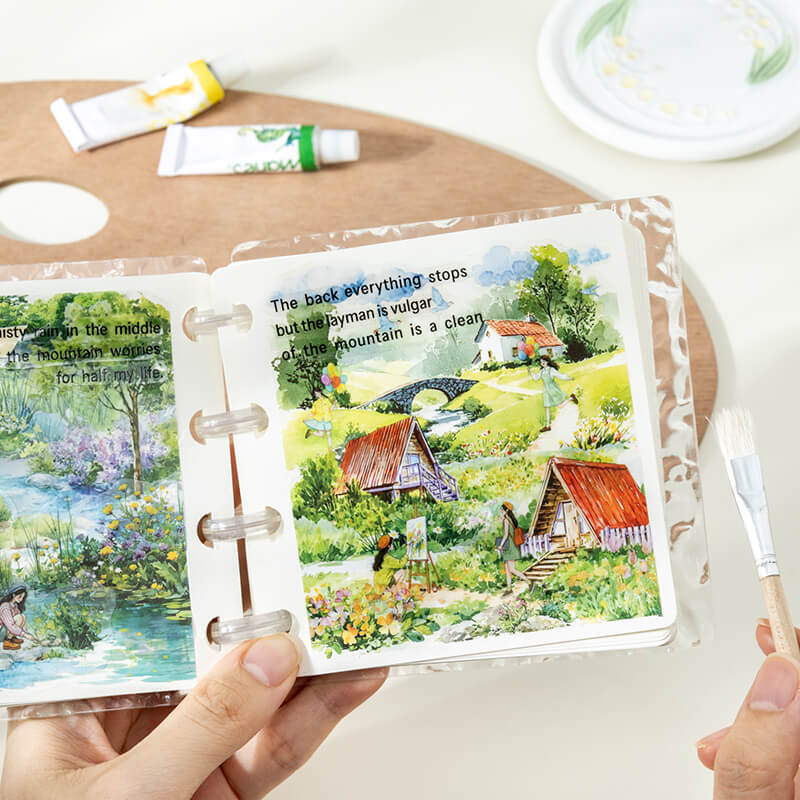 Ring-boundjournalpagedecoratedwithcountrysidecottages_greenfields_andmountainscenery