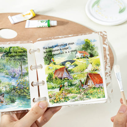 Ring-boundjournalpagedecoratedwithcountrysidecottages_greenfields_andmountainscenery