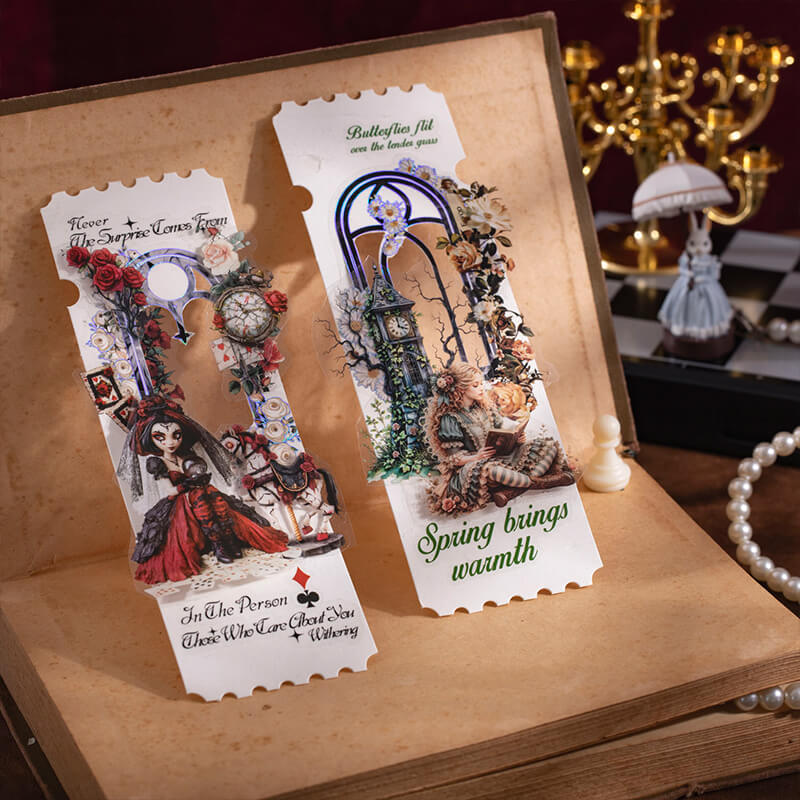 Two_handmade_bookmarks_decorated_with_Wonderland_character_stickers_floral_window_frames_roses_and_vintage_clocks