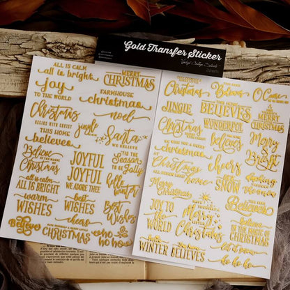 TwosheetsofgoldChristmaswordsUVtransferstickerswithfestiveholidayphrasesforDIYcrafts