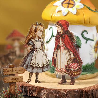 VintagefairytalestickersofAliceandLittleRedRidingHoodwithawickerbasketbesideagrandmother_scottagesign