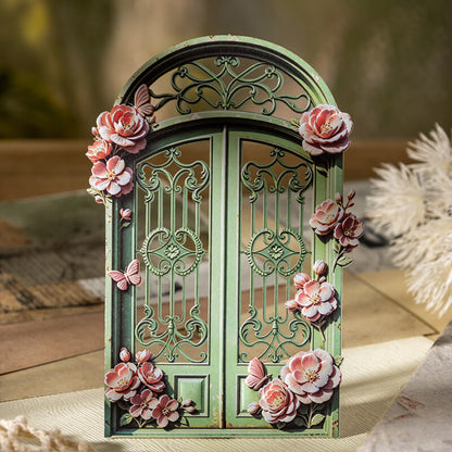 Vintagegreenfloralirondouble-doorcardstockembellishmentwithpinkflowersandbutterflies