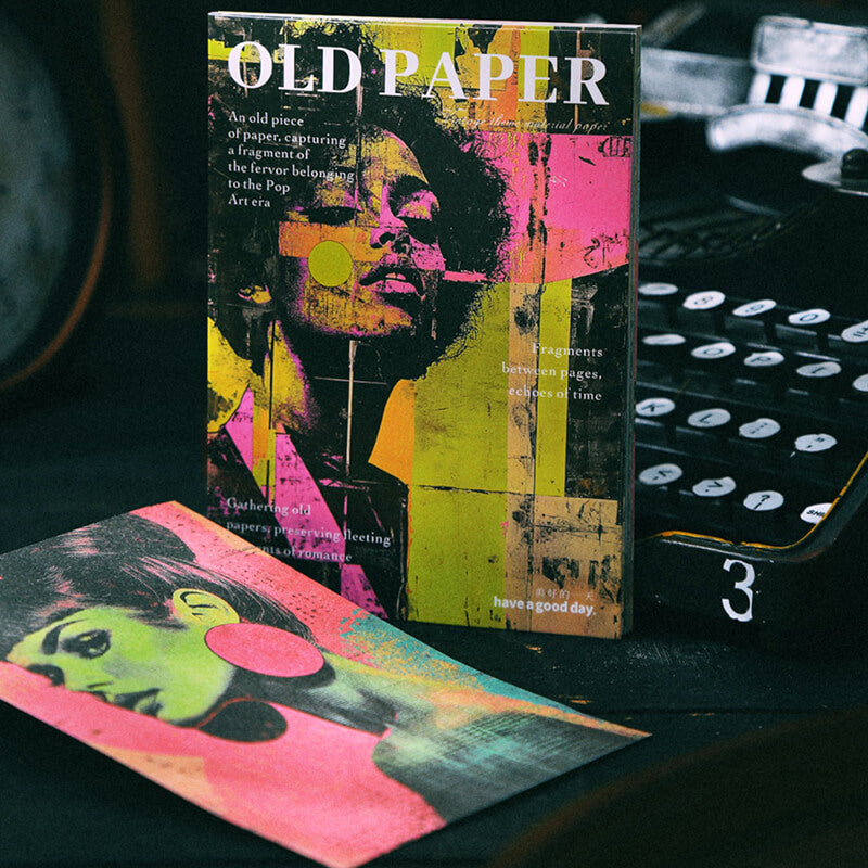 Vintagepopartcollagepaperpackfeaturingdistressedportraitsinneonpink_yellowandblackbesideatypewriter